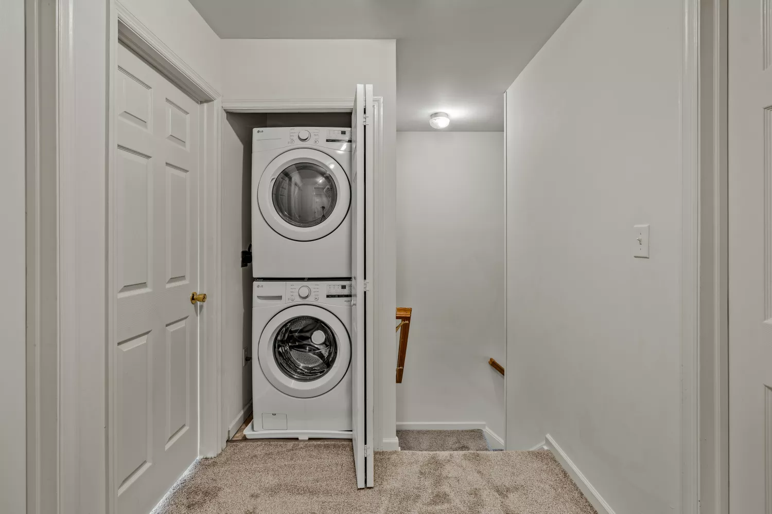 Windsor Commons Townhomes in-unit laundry with stacked washer and dryer conveniently located on the second floor