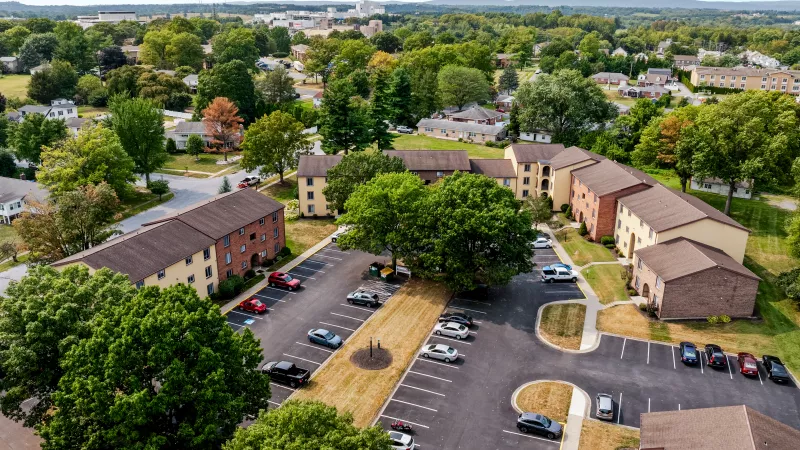 Aerial view of Rosedale Apartments community with nearby neighborhood and Hershey Medical Center visible in the distance
