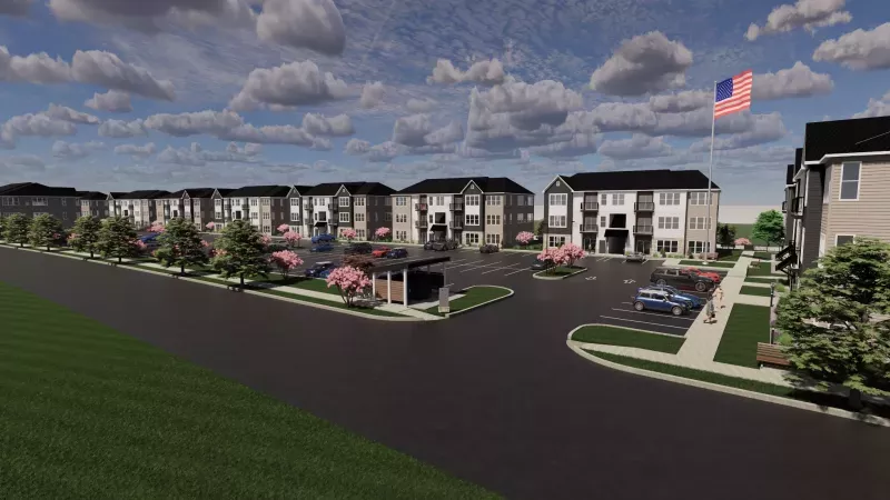 Architectural rendering of a large apartment complex with multiple modern buildings, parking lots, and an American flag.