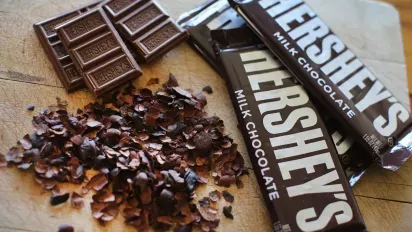 Hershey chocolate bars in wrapper, without wrapper, and chopped up.
